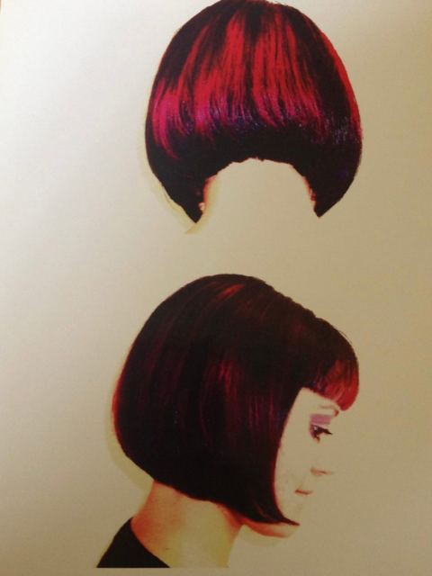 Red bob shown from the back and side, showing the graduated shape and glossed color